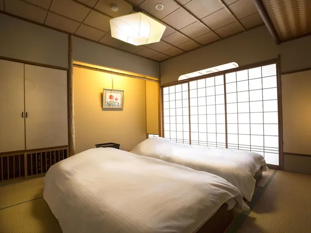 جناح جونيور بسريرين منفصلين وفرشتي فوتون في طابق منخفض، HOTEL YAGI 1/2