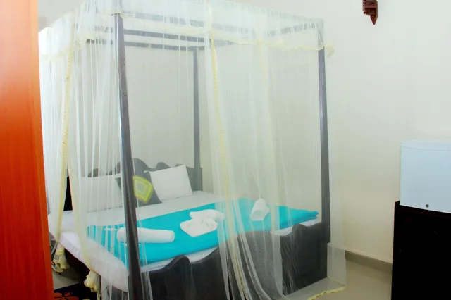 غرفة بسرير مزدوج بإطلالة جزئية على البحر، New Bay View Villa 1/1