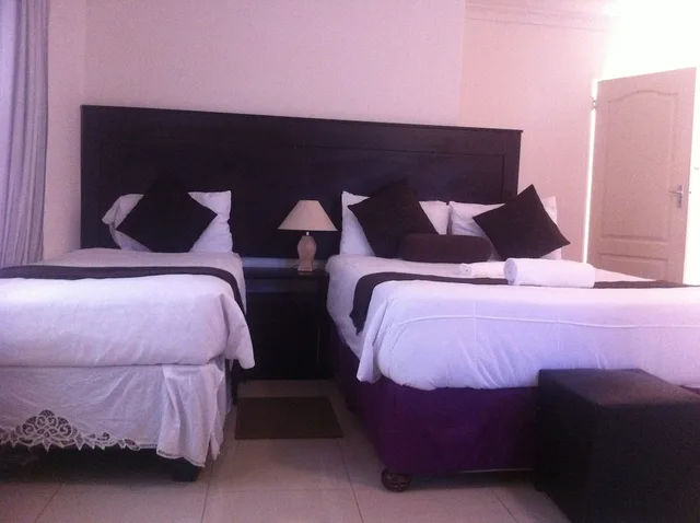 غرفة عائلية بسرير مزدوج وسرير فردي بإطلالة على الحديقة، Upper Room Guest House 1/4