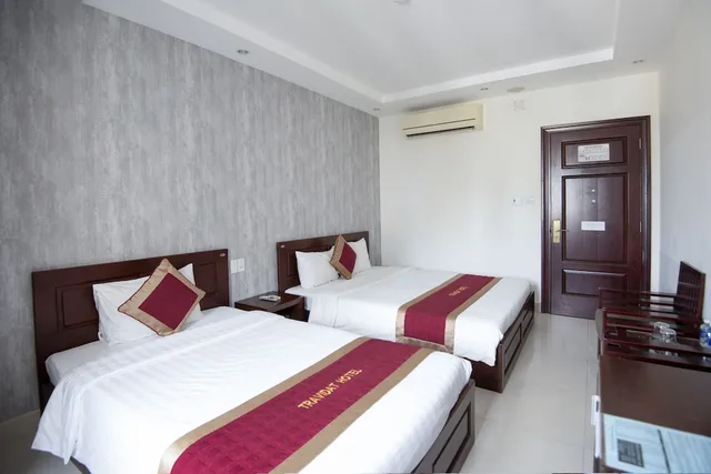 غرفة ديلوكس ثلاثية بسرير كوين وسرير فردي، Da Nang Port Hotel 2/3