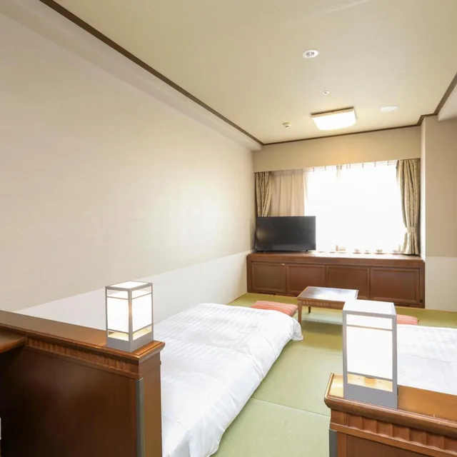 غرفة بسريرين منفصلين بأرضية تاتامي، Dormy Inn Premium Otaru 3/7