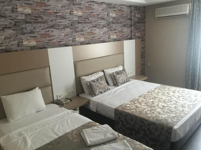 غرفة أساسية ثلاثية بثلاثة أسرّة، Grand Kayalar Hotel 1/7