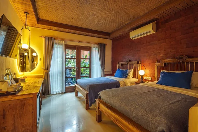 جناح كلاسيكي بسرير مزدوج وسريرين منفصلين بغرفتي نوم، Rama Phala Resort Spa 4/10
