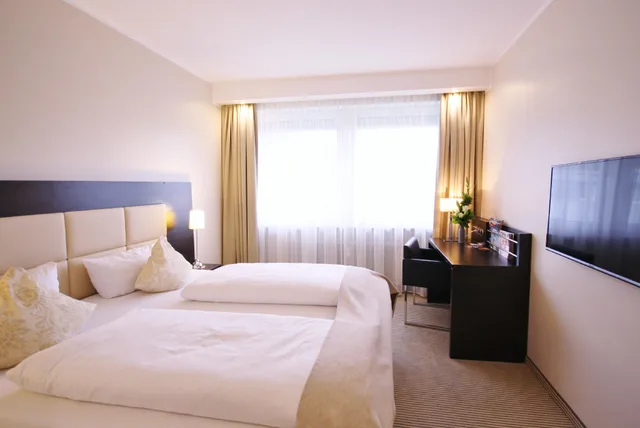 غرفة بسريرين منفصلين بإطلالة على الفناء، Hotel am Karlstor 1/1