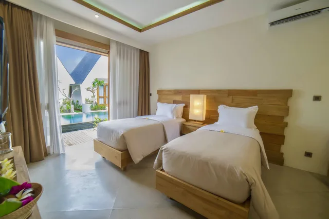 غرفة ديلوكس بسريرين منفصلين بإطلالة على المسبح، Ponte Villas 2/4