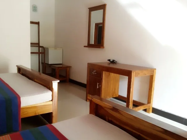 غرفة ديلوكس رباعية بسريرين كوين بإطلالة على الحديقة للمدخنين، Rich Resort & Restaurant 2/4