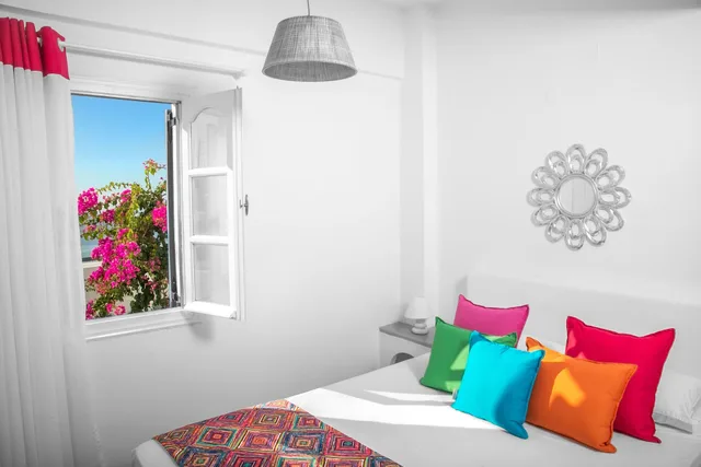Deluxe, Double Bed, Caldera View, Sofa, Abelonas Retreat Sunset & Sunrise Lodgins 1/2
