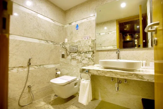 غرفة تنفيذية بسرير كينج بإطلالة على المدينة، Regenta Central The Crystal 8/9