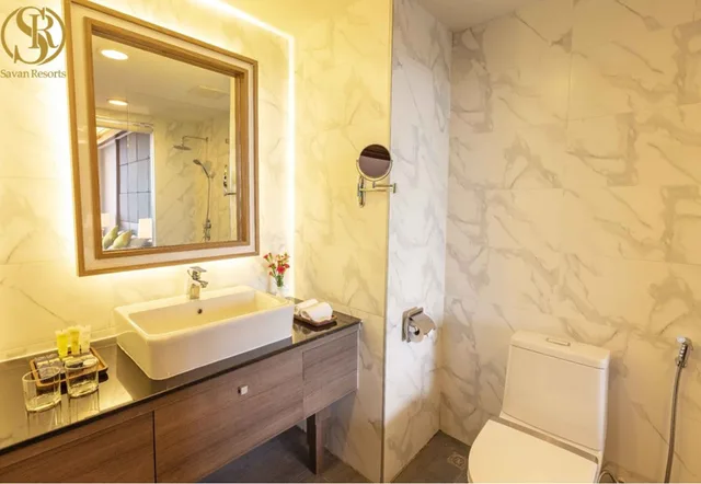 غرفة قياسية بسرير كينج وسريرين منفصلين، Savan Resorts 10/11