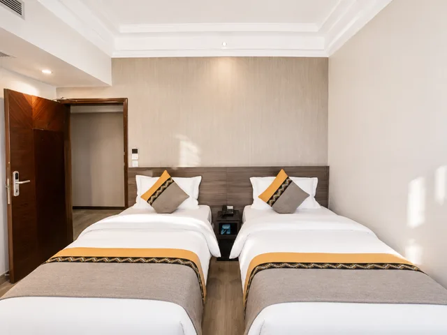 غرفة بسريرين منفصلين، Grand Harbour Hotel 1/9
