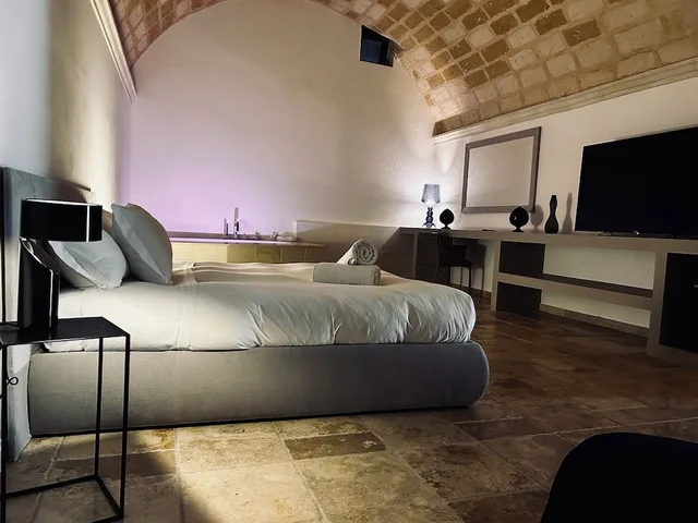 جناح ديلوكس بسرير كينج مع أريكة، Masseria Santa Lucia 1/3