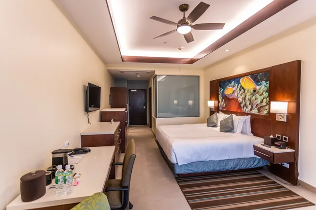غرفة ديلوكس بسريرين كوين، Surfrider Resort Hotel 5/7