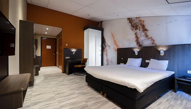 غرفة فاخرة بسرير كوين بحوض استحمام، Fletcher Wellness Hotel Brabant Mill 1/3