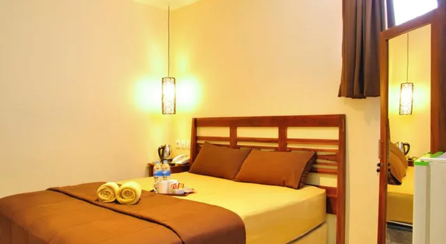 غرفة ديلوكس بسرير كوين، Kuta Sari House 2/4