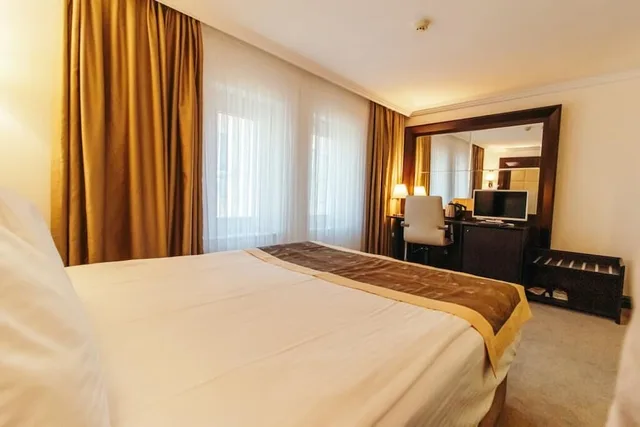 غرفة قياسية مفردة بسرير كوين، Ck Farabi Hotel 2/4