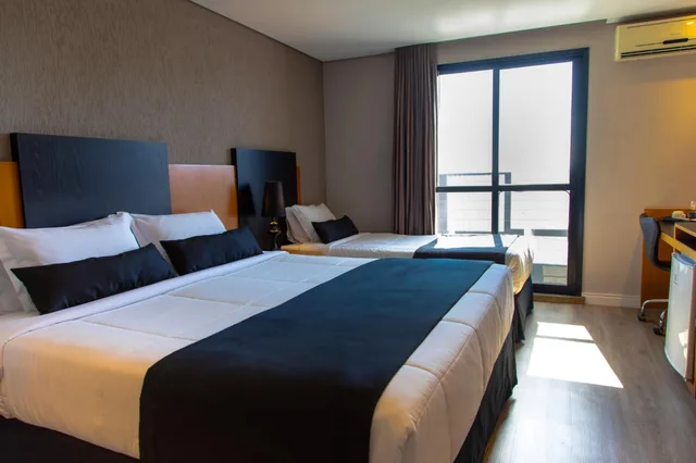 غرفة فاخرة عائلية بسرير مزدوج وسرير فردي، Slaviero Hotel Curitiba Batel 2/5