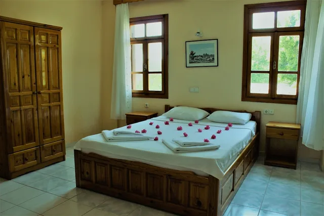 فيلا كومفورت بسرير كينج وسريرين منفصلين مع أريكة، Adilan Villas and Apartments 2/2