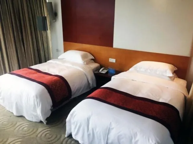 غرفة ديلوكس بسريرين منفصلين، Maihao International Hotel 1/2