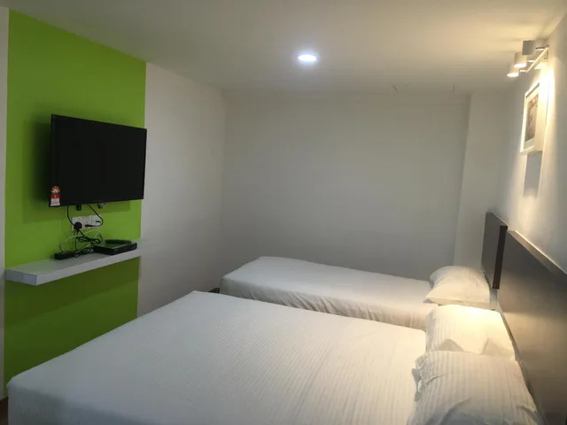 غرفة عائلية بسرير مزدوج وسريرين منفصلين، Apple Inn Hotel 1/2