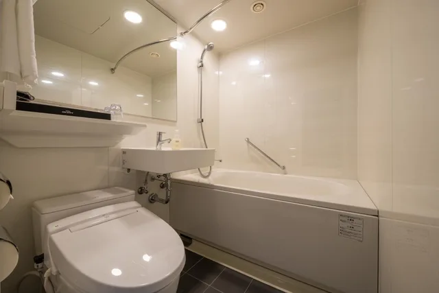 غرفة بسريرين منفصلين مع سرير إضافي، Hotel Jal City Sendai 5/5