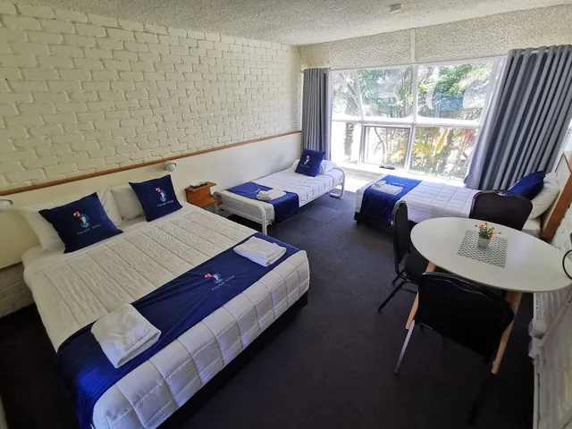 غرفة عائلية بسرير كوين وسريرين منفصلين، Aquajet Motel 1/5