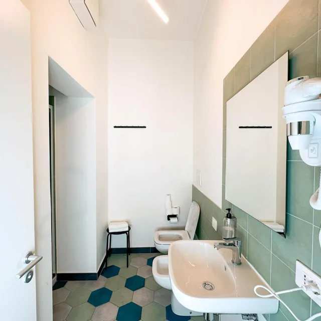 Mixed Dorm, 10 Beds، Ostello Bello 4/9