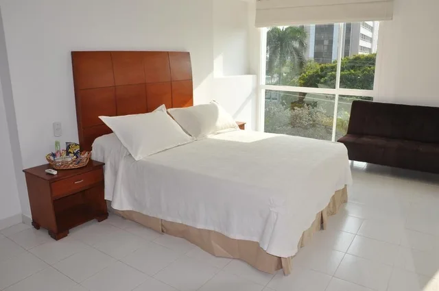 غرفة ديلوكس ثلاثية بسرير مزدوج مع أريكة، Coral Reef Hotel 3/9