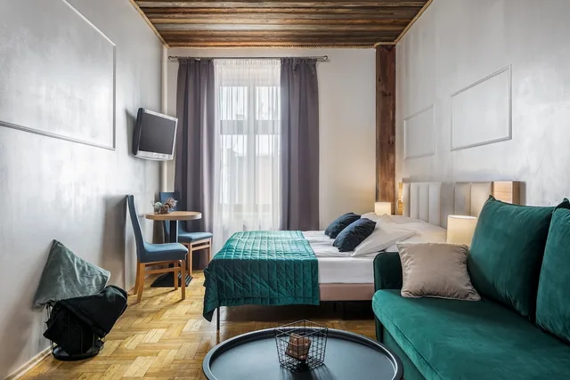 غرفة ديلوكس رباعية بسريرين منفصلين مع أريكة، Aparthotel Pergamin 4/7