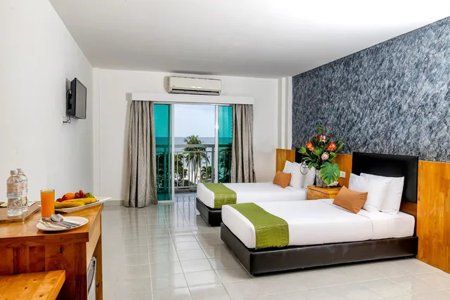 غرفة ديلوكس بسريرين منفصلين بشرفة، Langkapuri Resort Langkawi 2/2