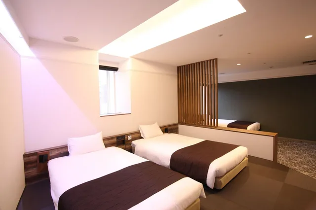 غرفة يابانية غربية عائلية بسرير مزدوج بحمام خاص بحوض استحمام، Quintessa Hotel Sapporo 5/8