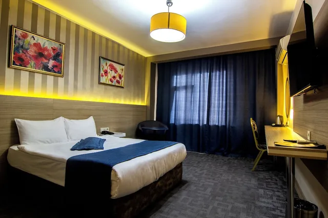 غرفة كومفورت رباعية بسرير مزدوج وسريرين منفصلين لذوي الإعاقة، Baykara Hotel 1/8