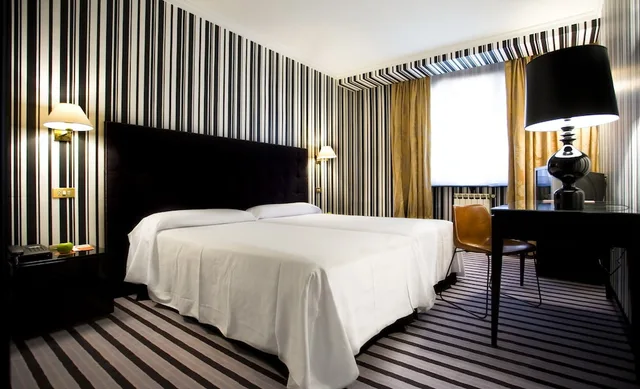 غرفة تنفيذية بسرير مزدوج مع أريكة، Hotel Clarin 1/2