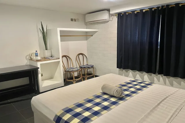 غرفة قياسية بسرير كوين، Taman Unique Hotel 5/10