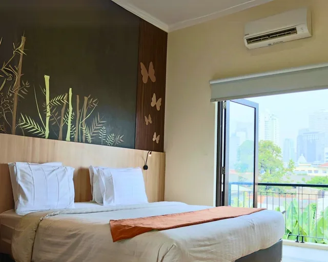 غرفة بريميير بسرير كينج بشرفة، D'Bamboo Suites 1/10