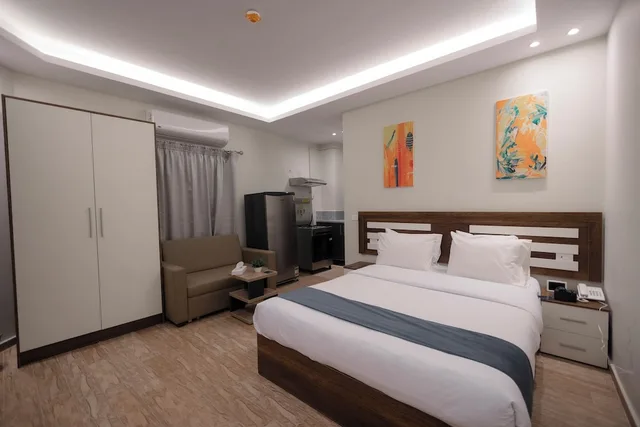 استوديو ديلوكس بسريرين منفصلين مع أريكة، Royal Inn Residence New Cairo 1/9