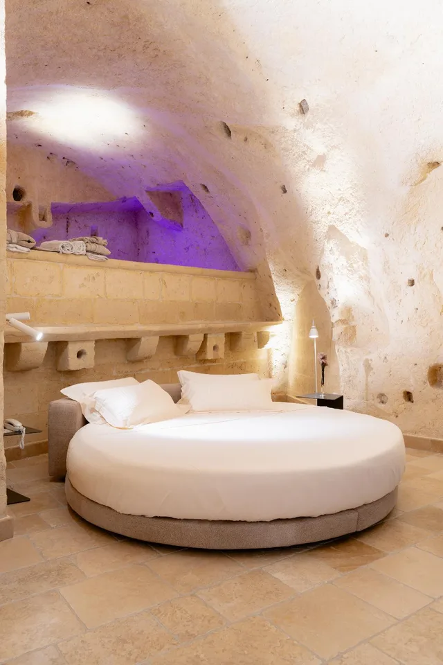 Suite King 2 Ad + 1 Inf، BV Quarry Matera 1/1