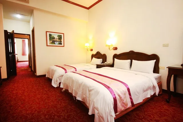 غرفة قياسية ثلاثية بسرير مزدوج وسرير فردي، East Commercial Affairs Hotel 1/2