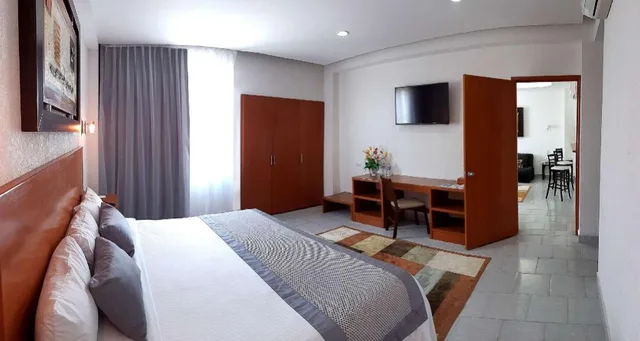 جناح تنفيذي بسريرين مزدوجين بغرفتين مع أريكة بمنطقة جلوس، Best Western Global Express 1/3