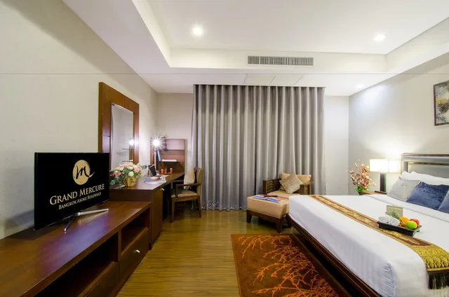 جناح تنفيذي بسرير كينج بشرفة، Grand Mercure Bangkok Asoke Residence 1/10