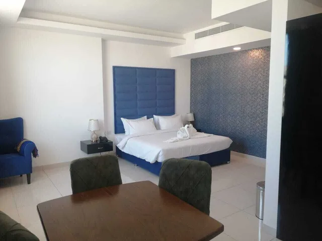 غرفة ديلوكس بسرير كوين، Parkside Plaza Hotel 2/4