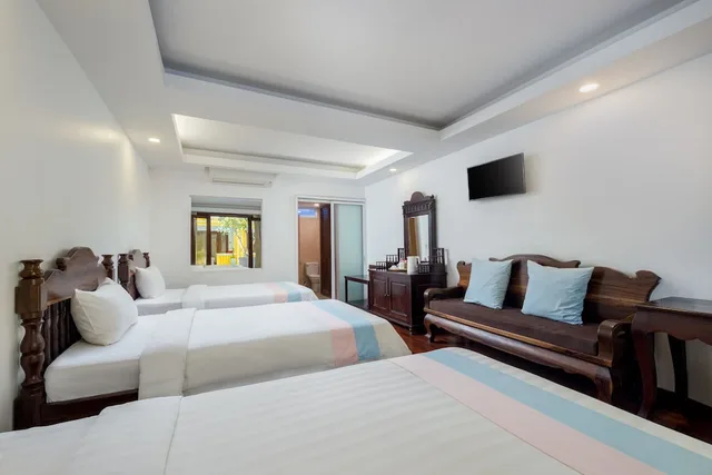 غرفة ديلوكس ثلاثية بثلاثة أسرّة، La Residence WatBo Hotel 1/10