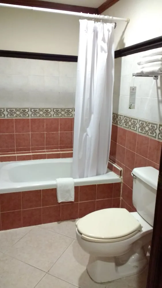Room, Triple, 1 Single and 2 Queen Beds، Hotel Suites Flamboyanes by Kavia 5/7