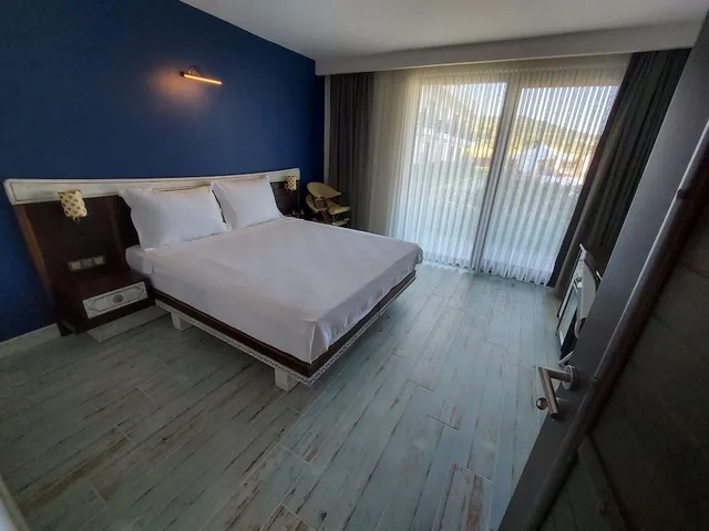 غرفة عائلية رباعية بسرير مزدوج وسريرين منفصلين بشرفة، Assos Barbarossa Hotel 6/10