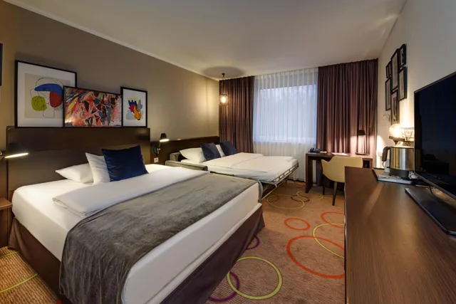 غرفة عائلية ثلاثية مع أريكة، Leonardo Hotel Hannover Medical Park 4/8