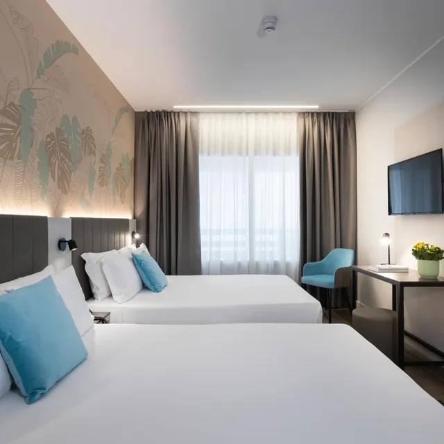 غرفة سوبيريور بسريرين كوين، iH Hotels Milano Centrale 1/10