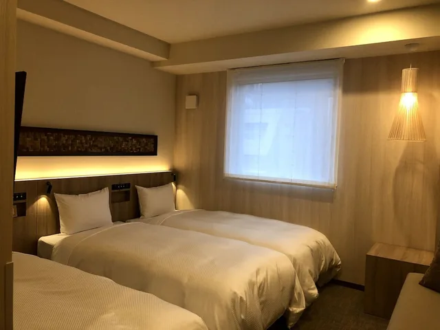 غرفة ثلاثية بسريرين منفصلين مع أريكة، Hotel IL FIORE Kasai 1/10