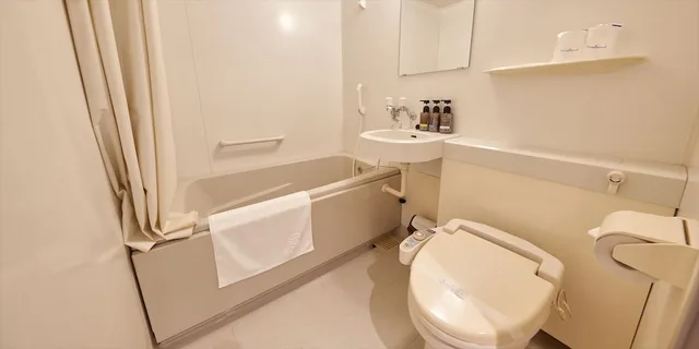 غرفة يابانية غربية بسريرين منفصلين بإطلالة على البحر، Miyuki Hamabaru Resort 10/10