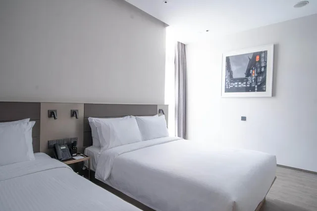 غرفة عائلية، Meichen Hotel 1/6