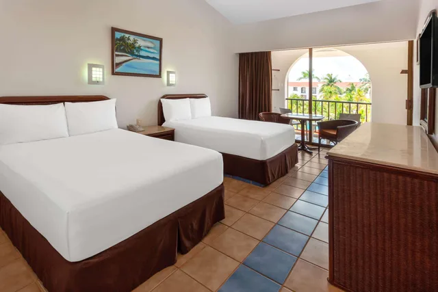 جناح بسرير كينج وسريرين مزدوجين بغرفتي نوم، Cozumel Hotel & Resort 1/1