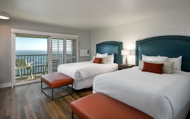 غرفة ديلوكس بسريرين كوين بإطلالة جزئية على البحر لذوي الإعاقة، Pacific Point Resort 2/5